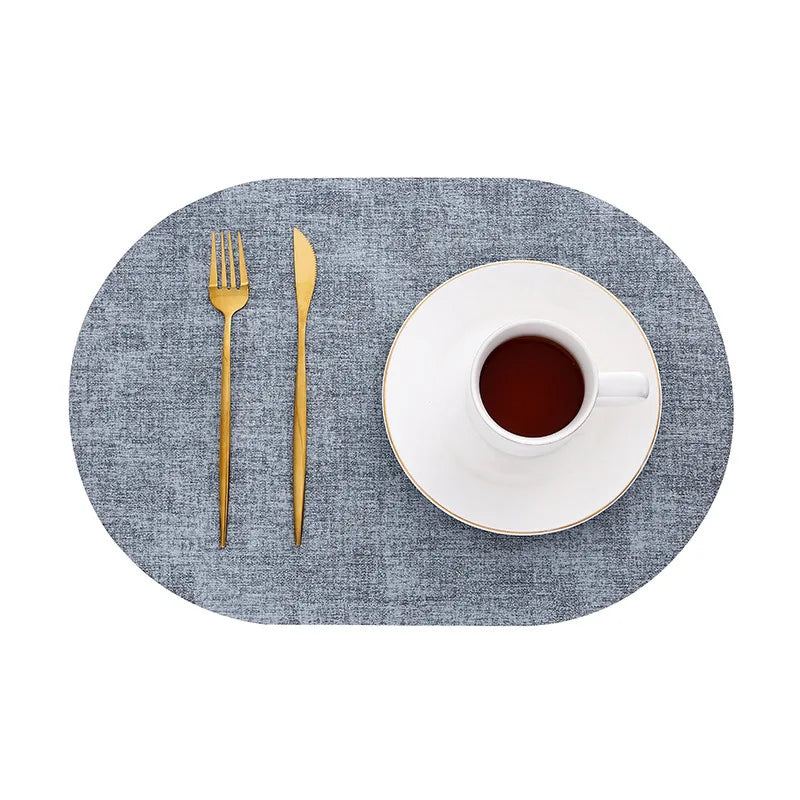 Oval Faux Leather Placemats – Fog blue