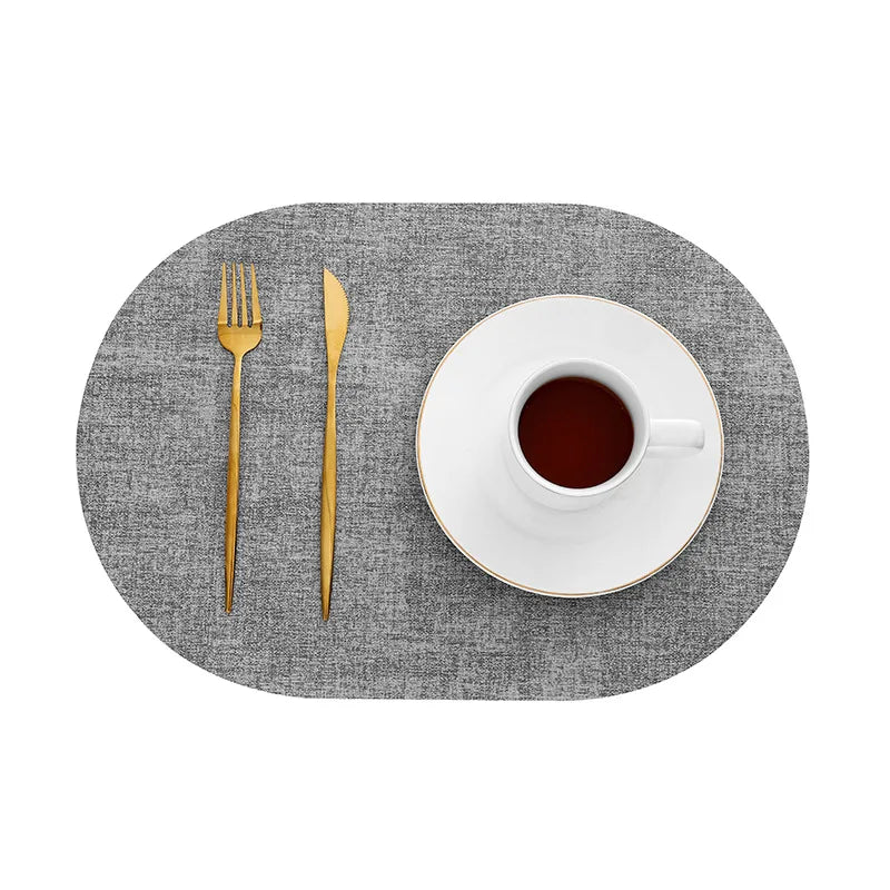 Oval Faux Leather Placemats – Light grey