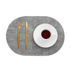 Oval Faux Leather Placemats – Light grey
