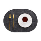 Oval Faux Leather Placemats – Dark grey