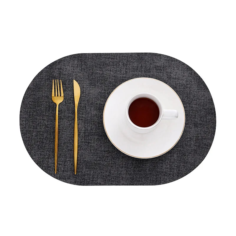 Oval Faux Leather Placemats – Dark grey